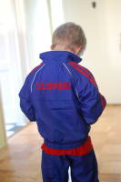 dsc_0289.jpg To Devin's credit, he took this off as soon as he got in the car out of mom's sights.