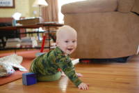 dsc_7023.jpg Devin is starting to crawl.