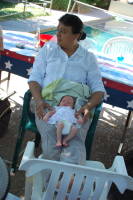 dsc_9961.jpg Dipti with one of the twins (we think it might be Lucy)