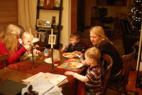 dsc_4574.jpg The boys sit down for dinner.