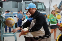 dsc_4264.jpg Dad can still serve with Devin tucked into the Baby Bjorn