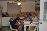 dsc_4400.jpg Re-united with Grandpa & JoJo, the Morris clan chows down on Cristaldis.