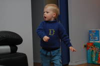 dsc_7220.jpg Showing off his new JoJo sweater in our apartment.