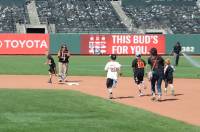 dsc_8559.jpg Children get to round the bases after the game.