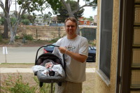 dsc_1931.jpg Vince carries Devin across the threshold for the first time.