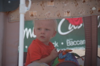 dsc_3480orig3513.jpg Riley hangs out in his Pack N' Play during the matches.